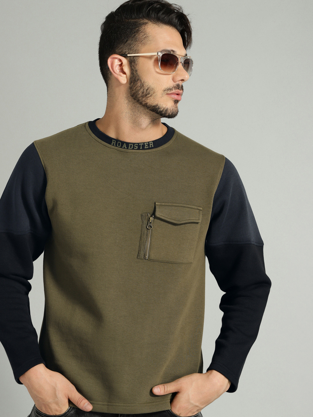 

The Roadster Lifestyle Co Men Olive Green Solid Pullover Sweatshirt
