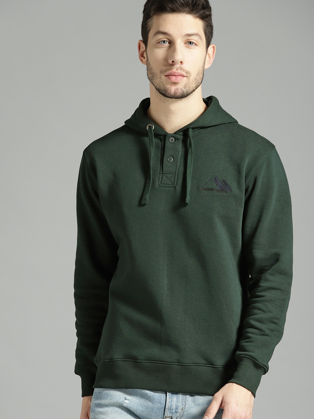 

The Roadster Lifestyle Co Men Green Solid Hooded Sweatshirt