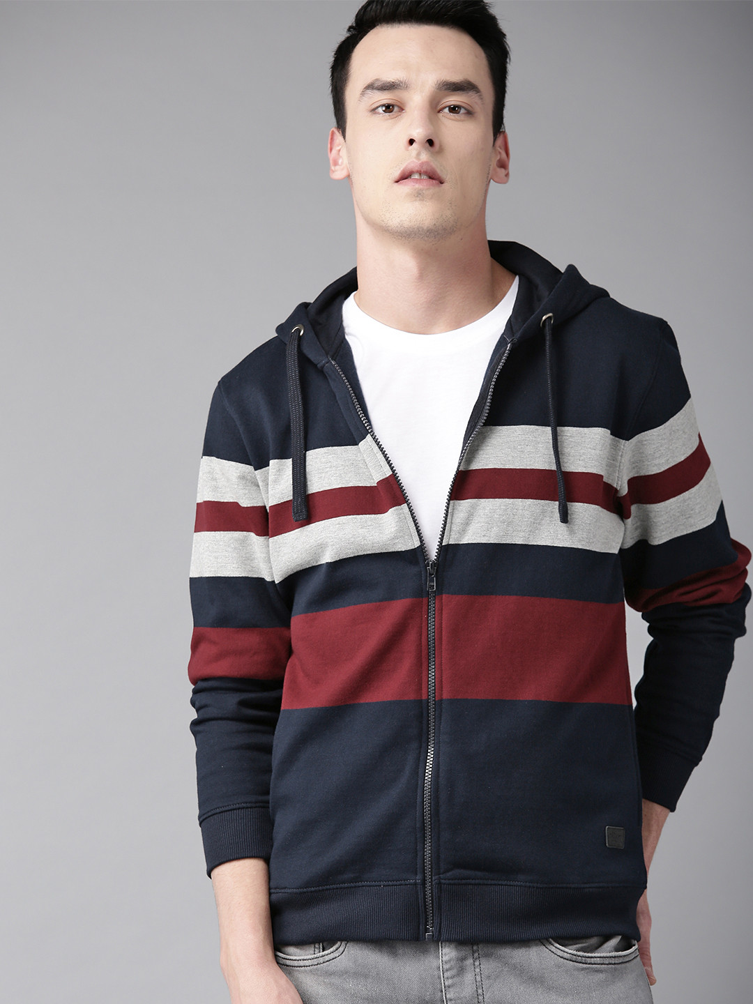 

The Roadster Lifestyle Co Men Navy Blue & Maroon Engineered Striped Hooded Sweatshirt