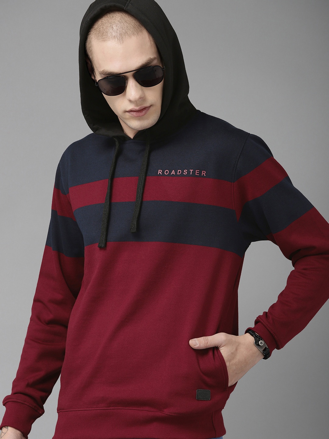 

The Roadster Lifestyle Co Men Burgundy & Navy Blue Striped Hooded Sweatshirt