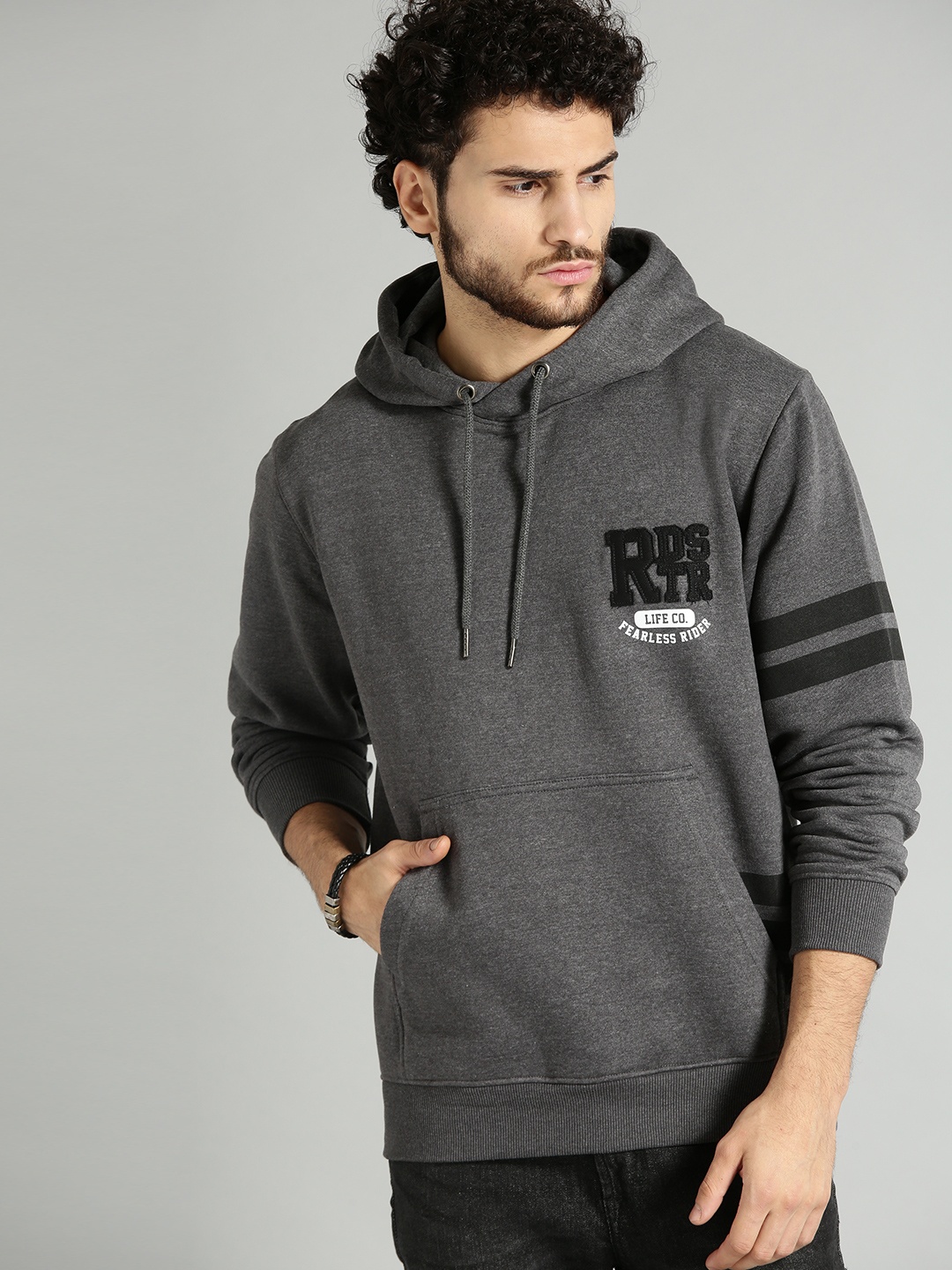 

The Roadster Lifestyle Co Men Charcoal Grey Solid Hooded Sweatshirt