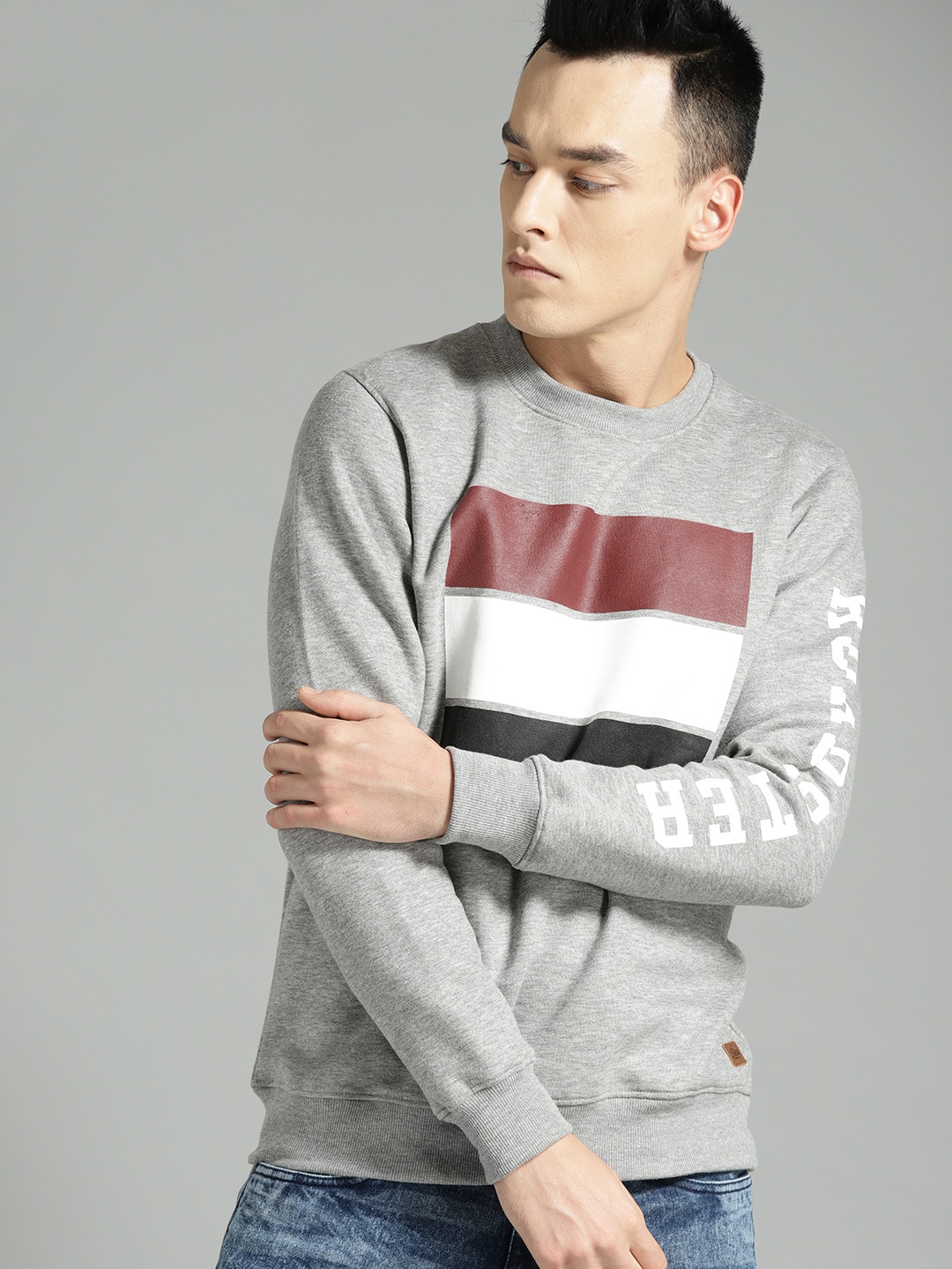 

The Roadster Lifestyle Co Men Grey Melange Striped Sweatshirt