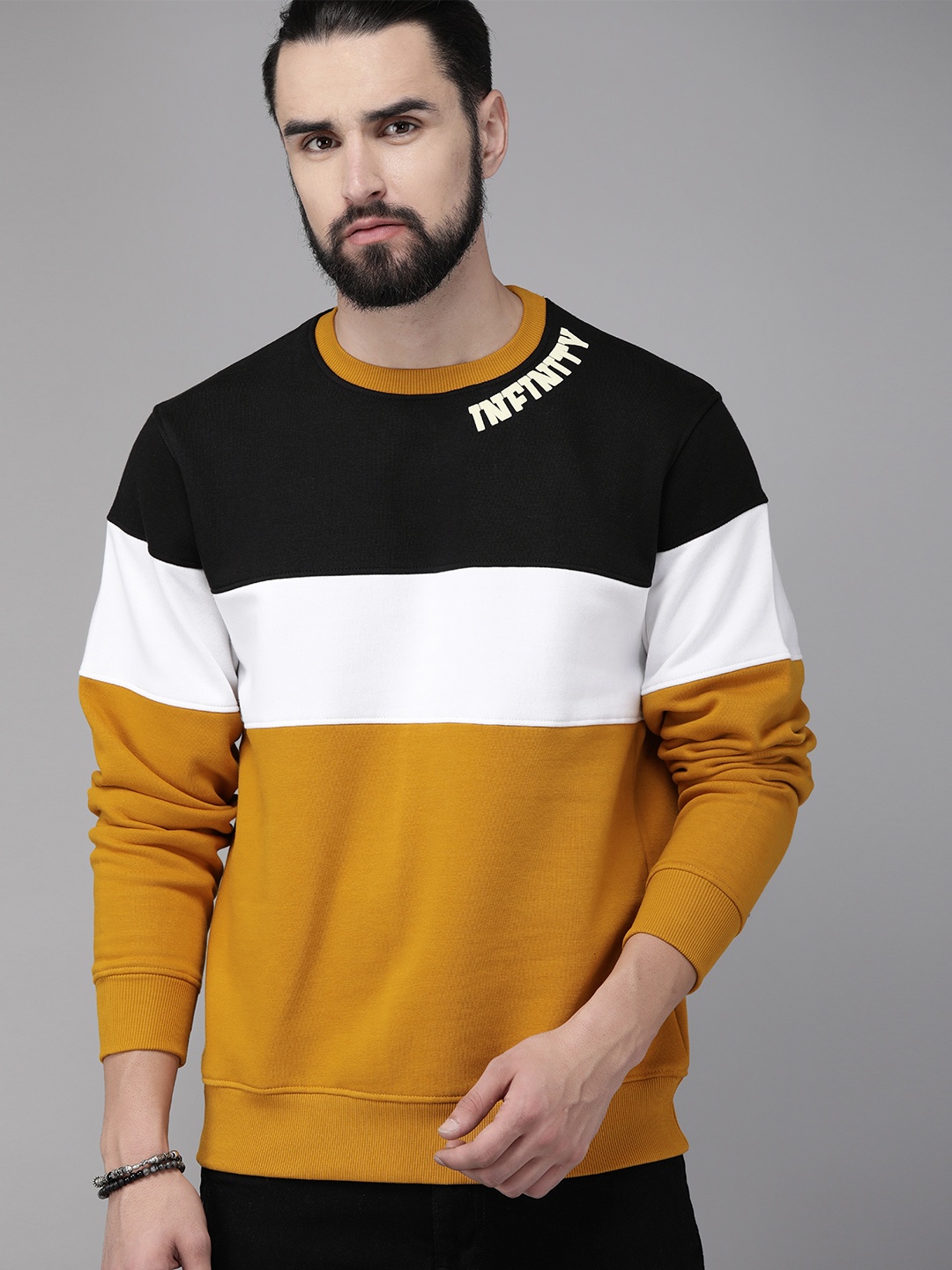 

The Roadster Lifestyle Co Men Mustard Yellow & White Colourblocked Sweatshirt