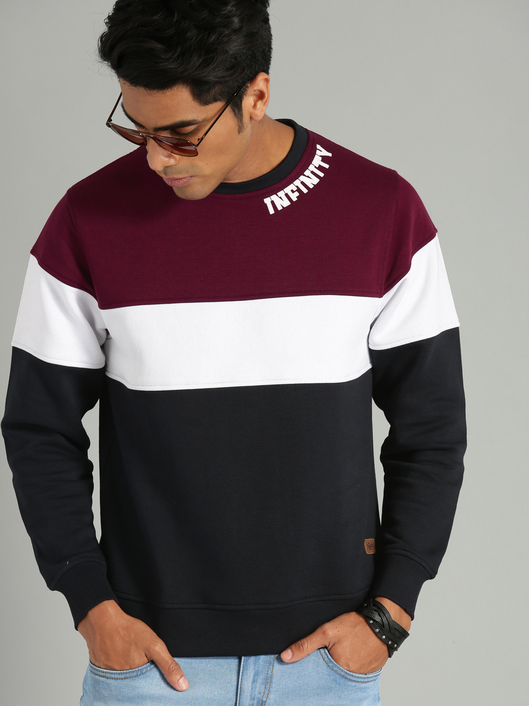 

The Roadster Lifestyle Co Men Navy Blue & Burgundy Colourblocked Sweatshirt