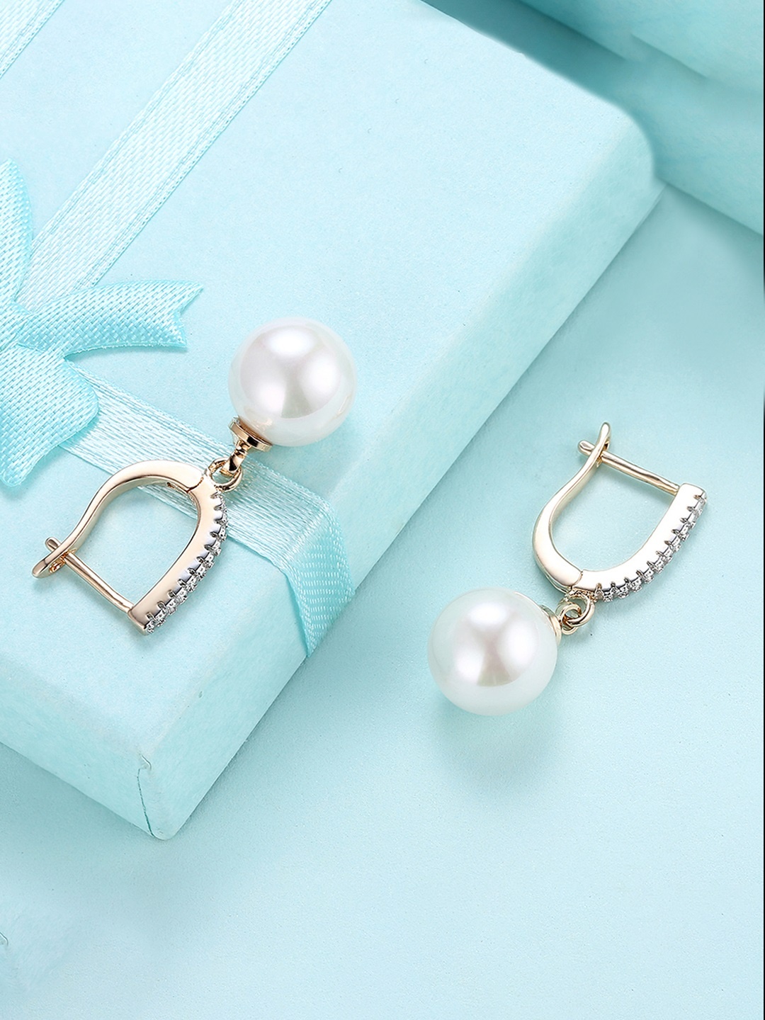 

Peora White Contemporary Hoop Earrings