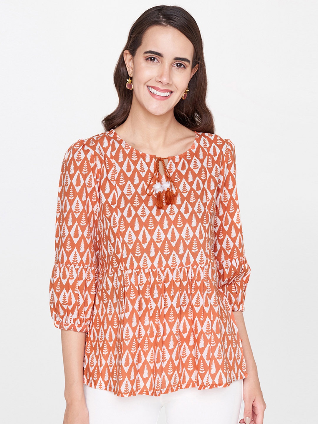 

Global Desi Women Rust Floral Printed Top