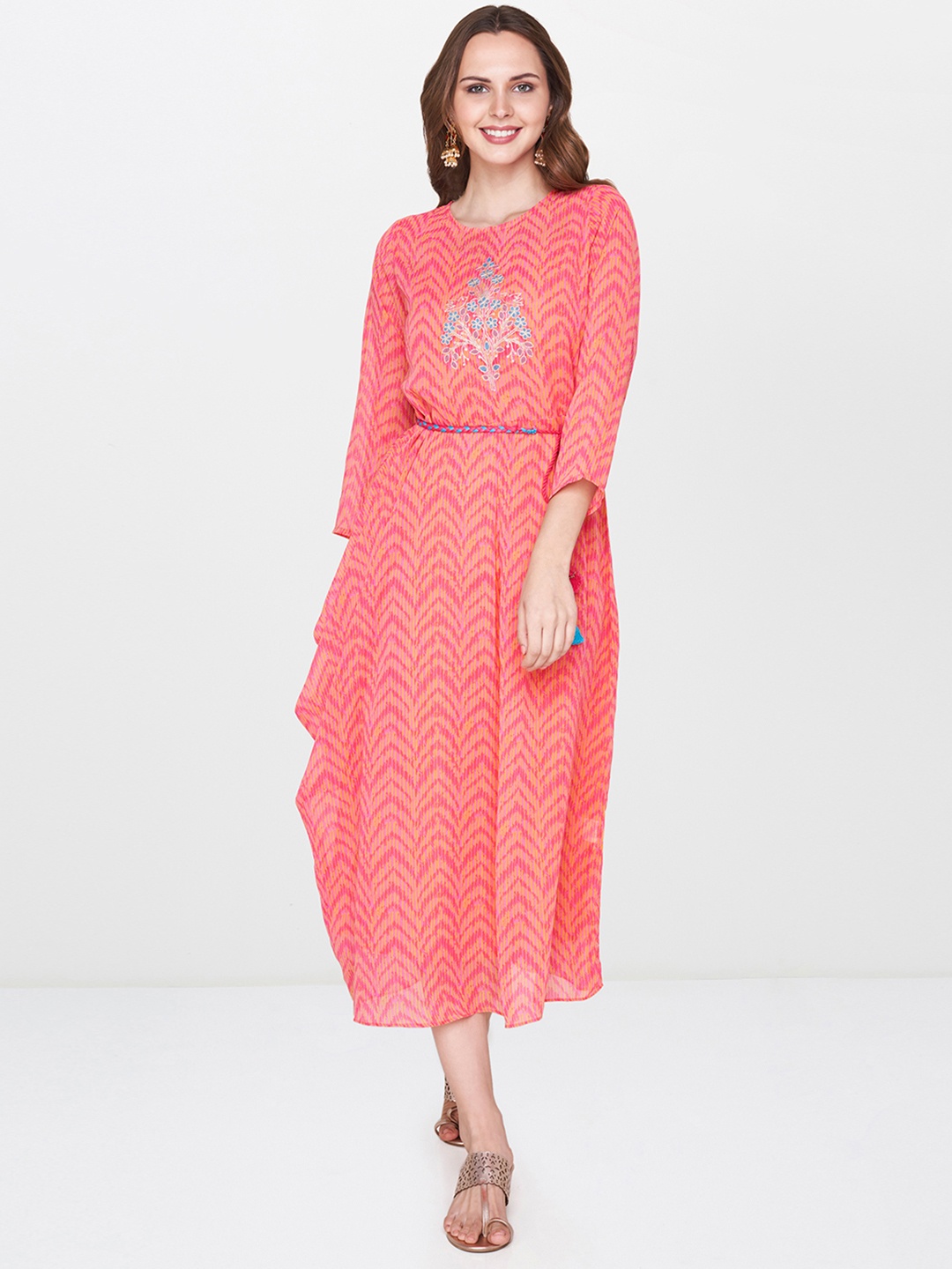 

Global Desi Women Peach-Coloured Printed Fit and Flare Dress