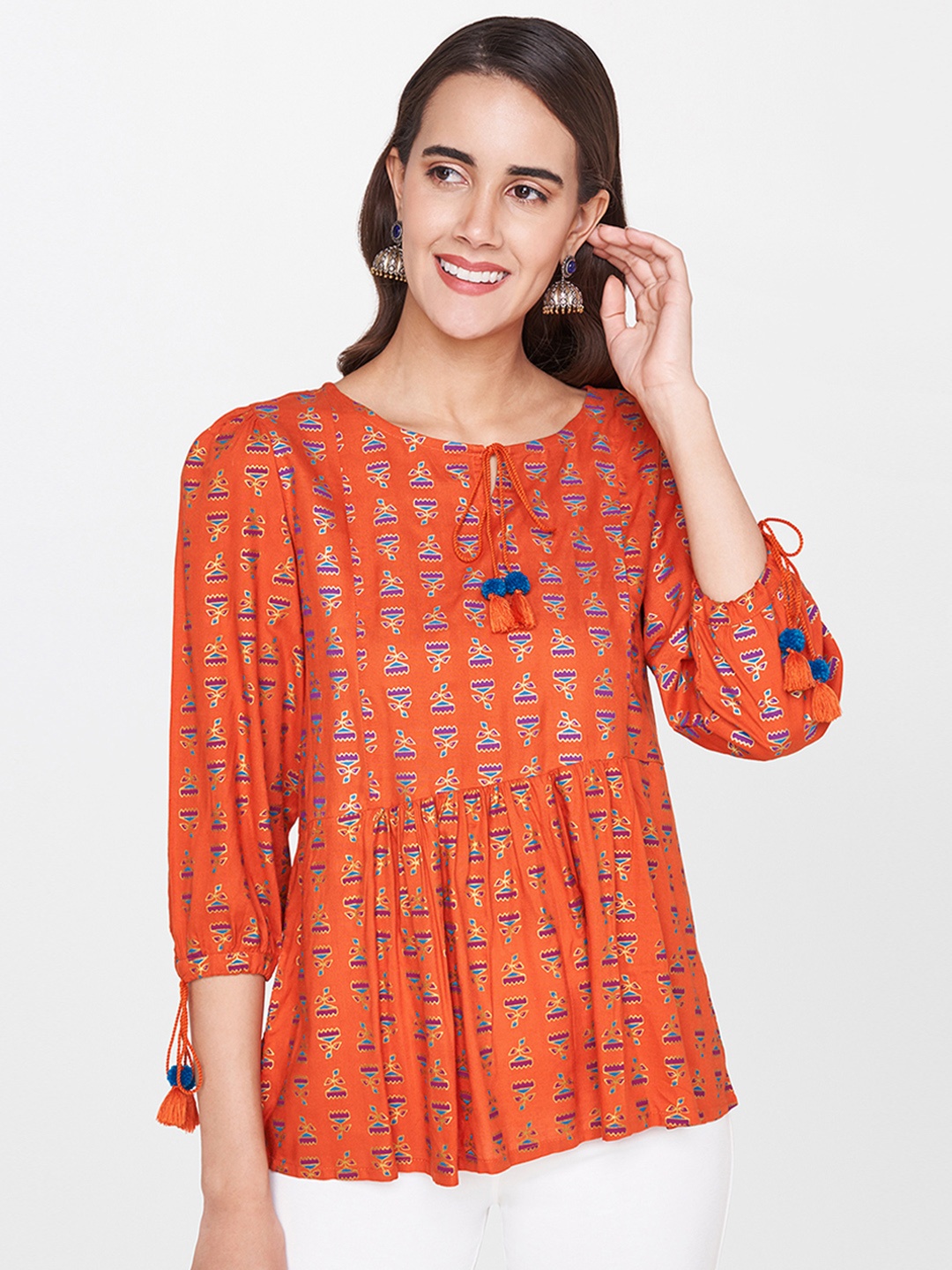 

Global Desi Women Orange Printed Top
