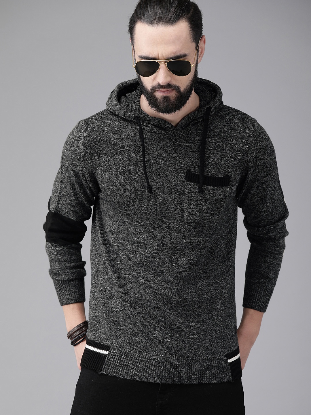

The Roadster Lifestyle Co Men Charcoal Grey Solid Hooded Pullover Sweater