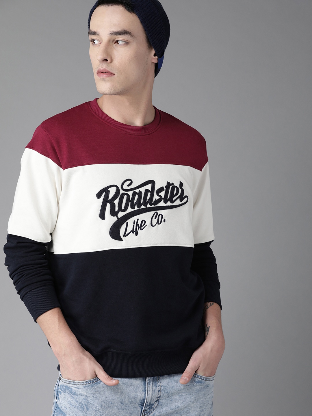 

The Roadster Lifestyle Co Men Maroon & Off-White Colourblocked Sweatshirt