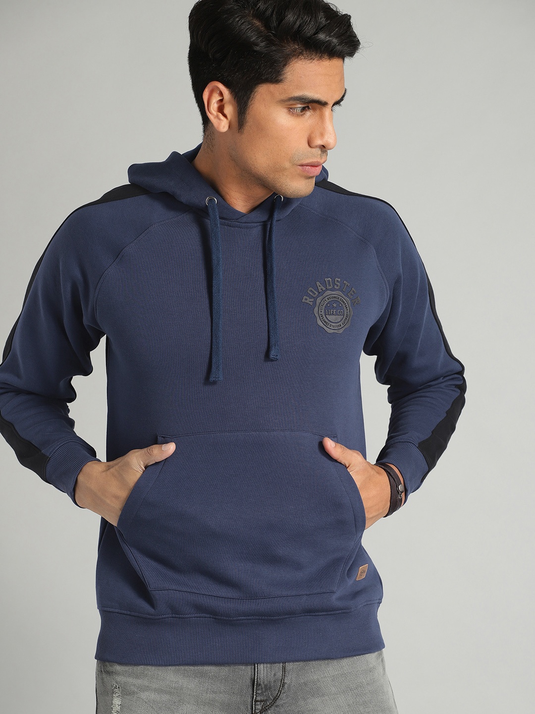 

The Roadster Lifestyle Co Men Blue Solid Hooded Sweatshirt