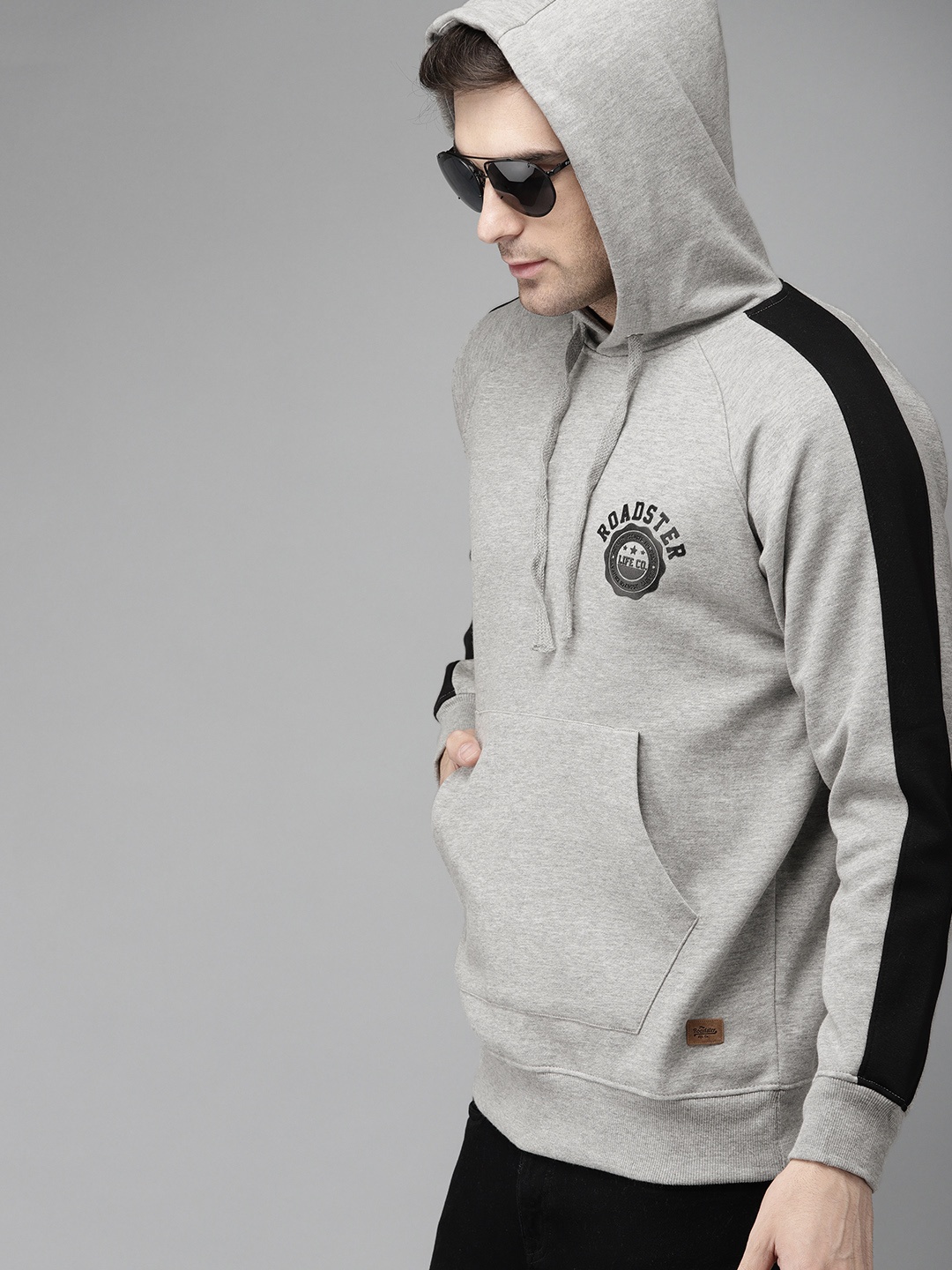 

The Roadster Lifestyle Co Men Grey Melange Solid Hooded Sweatshirt