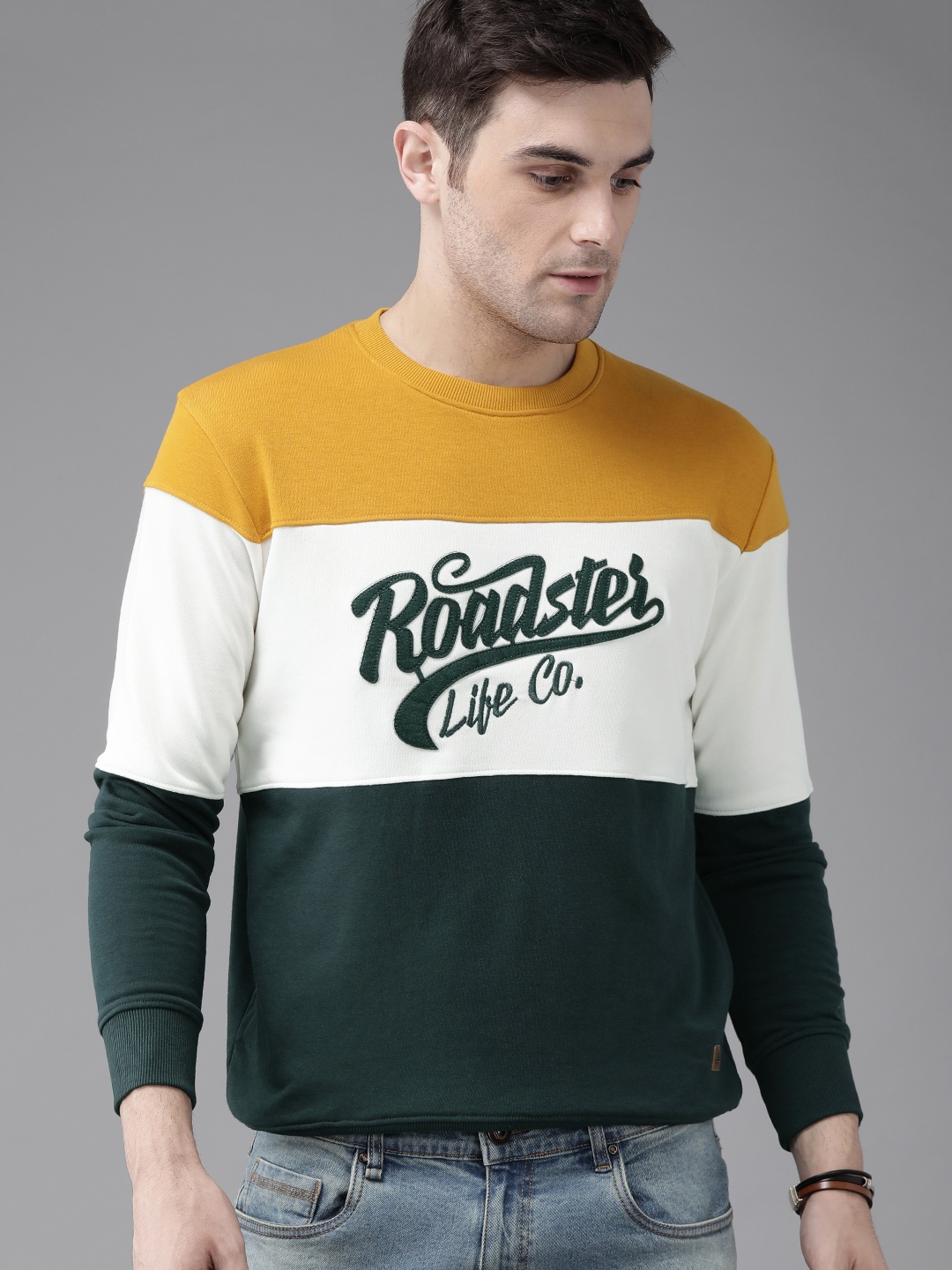 

The Roadster Lifestyle Co Men Mustard Yellow & White Colourblocked Sweatshirt