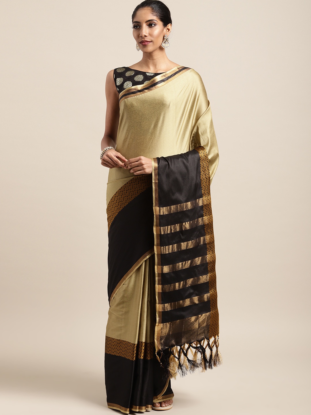 

Satrani Beige Solid Saree
