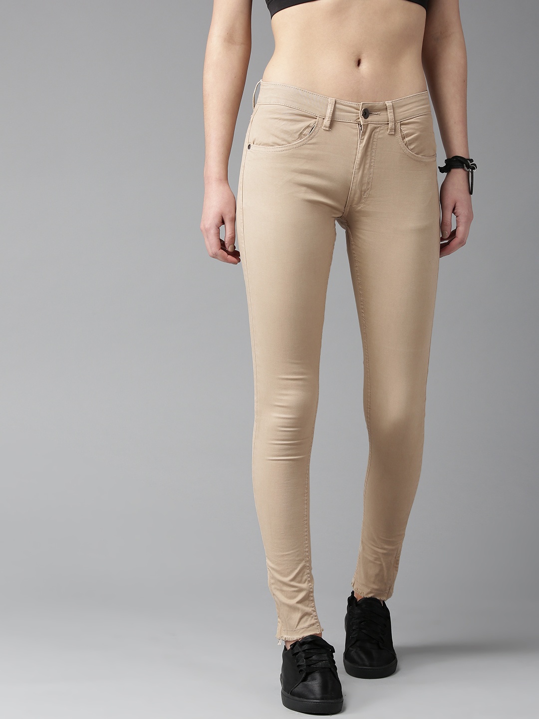 

The Roadster Lifestyle Co Women Beige Regular Fit Solid Trousers