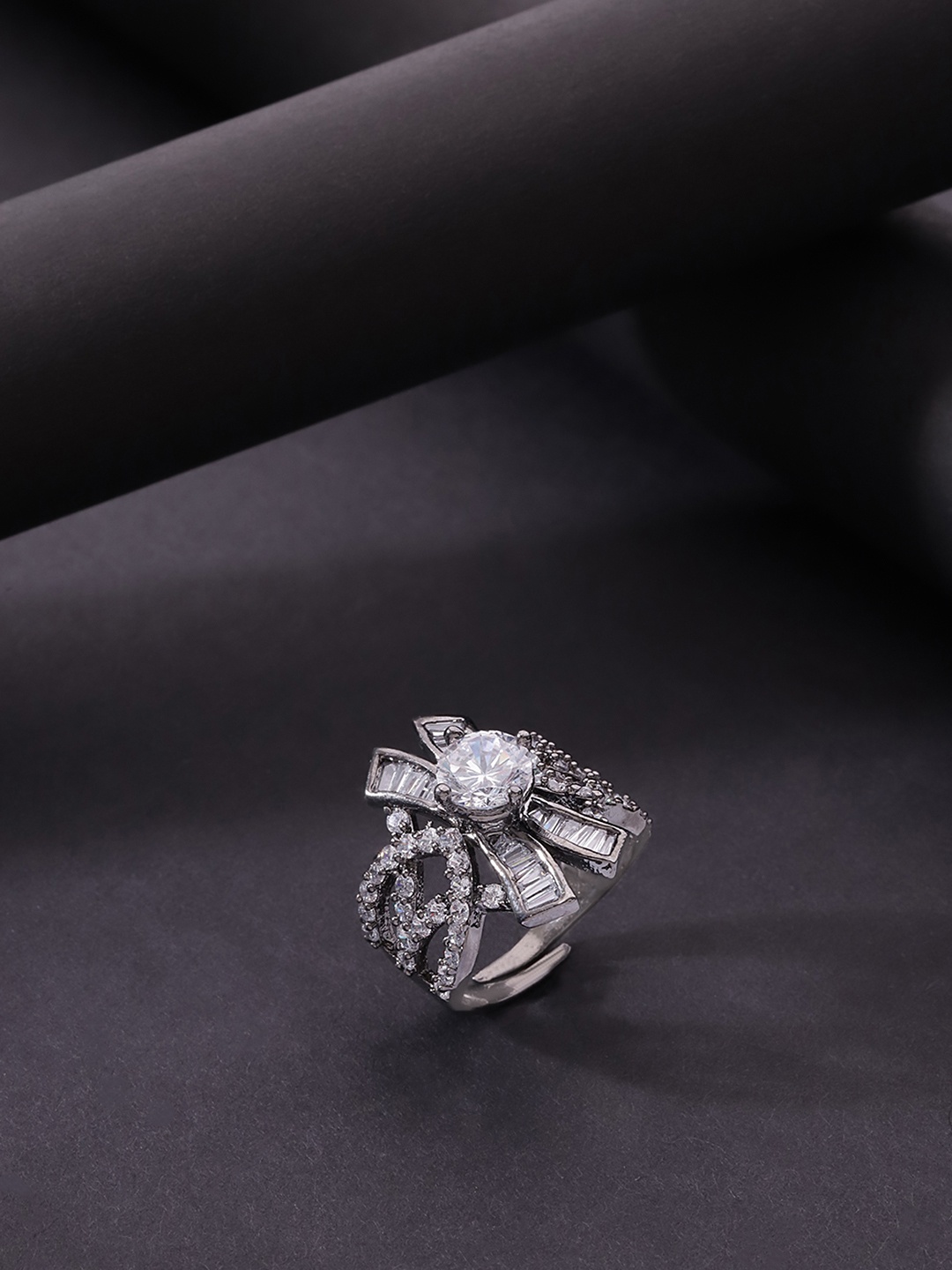 

Priyaasi Gunmetal Plated AD & CZ Studded Adjustable Ring, Grey melange