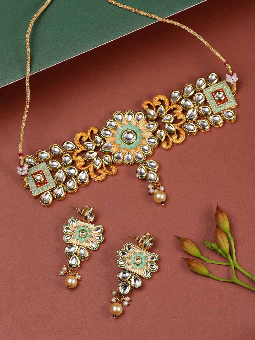 

Priyaasi Mint Green & Peach-Coloured Gold-Plated Kundan Stone-Studded Jewellery Set