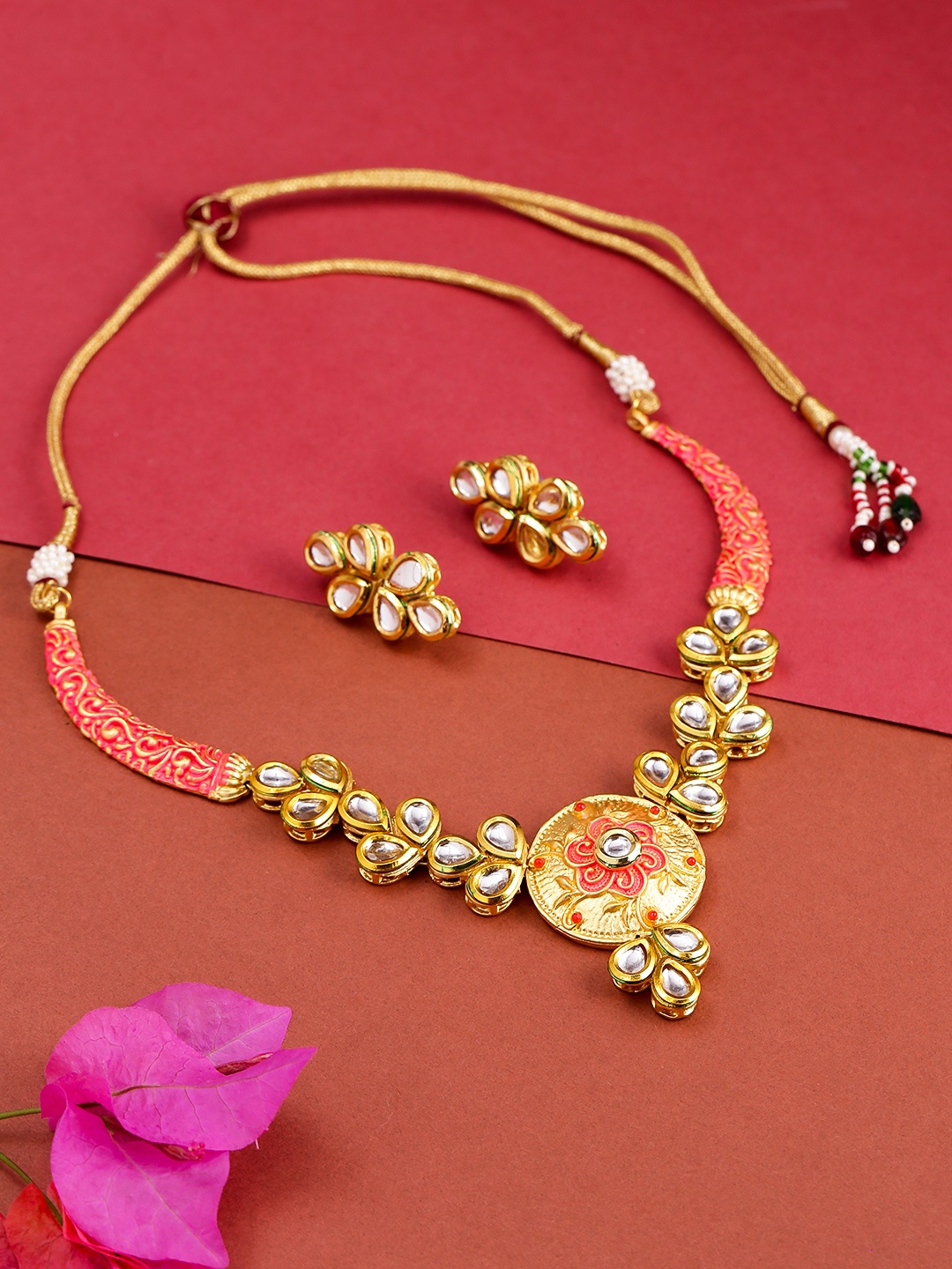 

Priyaasi Coral Pink Gold-Plated Kundan Stone-Studded Jewellery Set