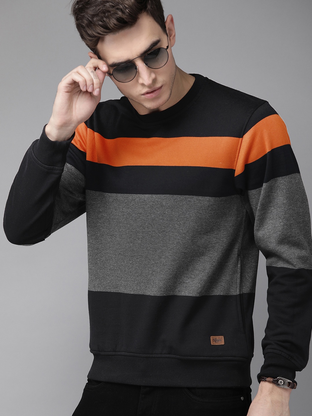 

The Roadster Lifestyle Co Men Charcoal Grey & Black Colourblocked Sweatshirt