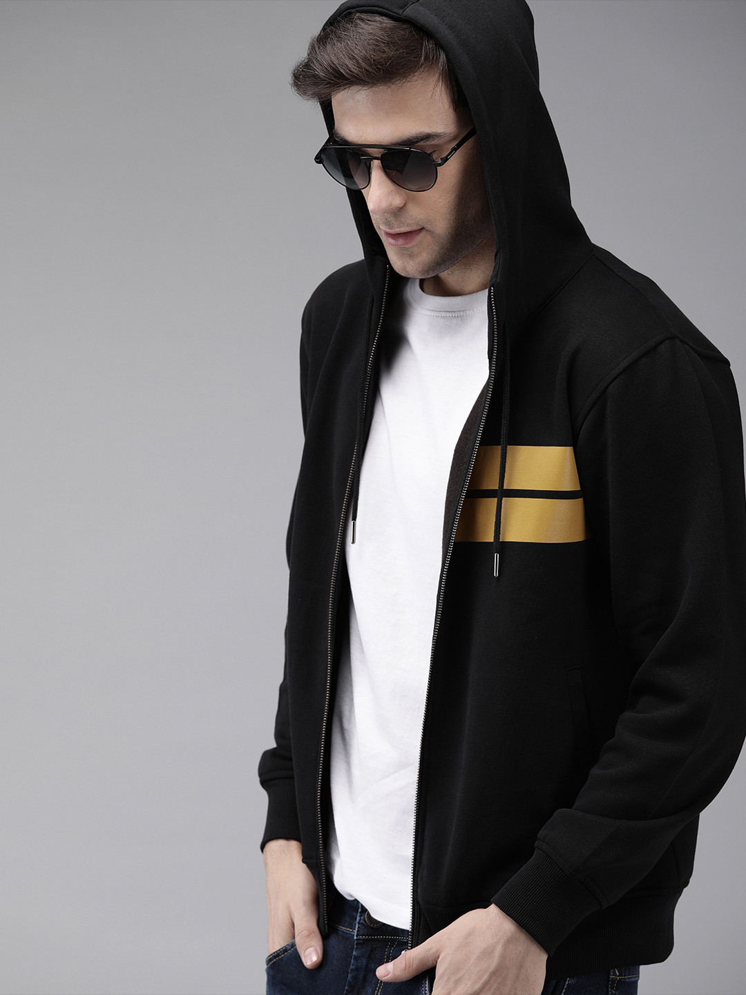 

The Roadster Lifestyle Co Men Black Solid Hooded Sweatshirt