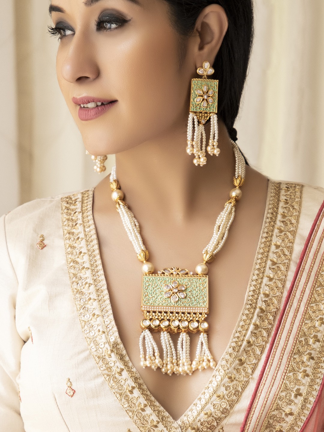 

Rubans Women Gold-Toned & Green Handpainted Kundan & Pearl Embellished Jewellery Set