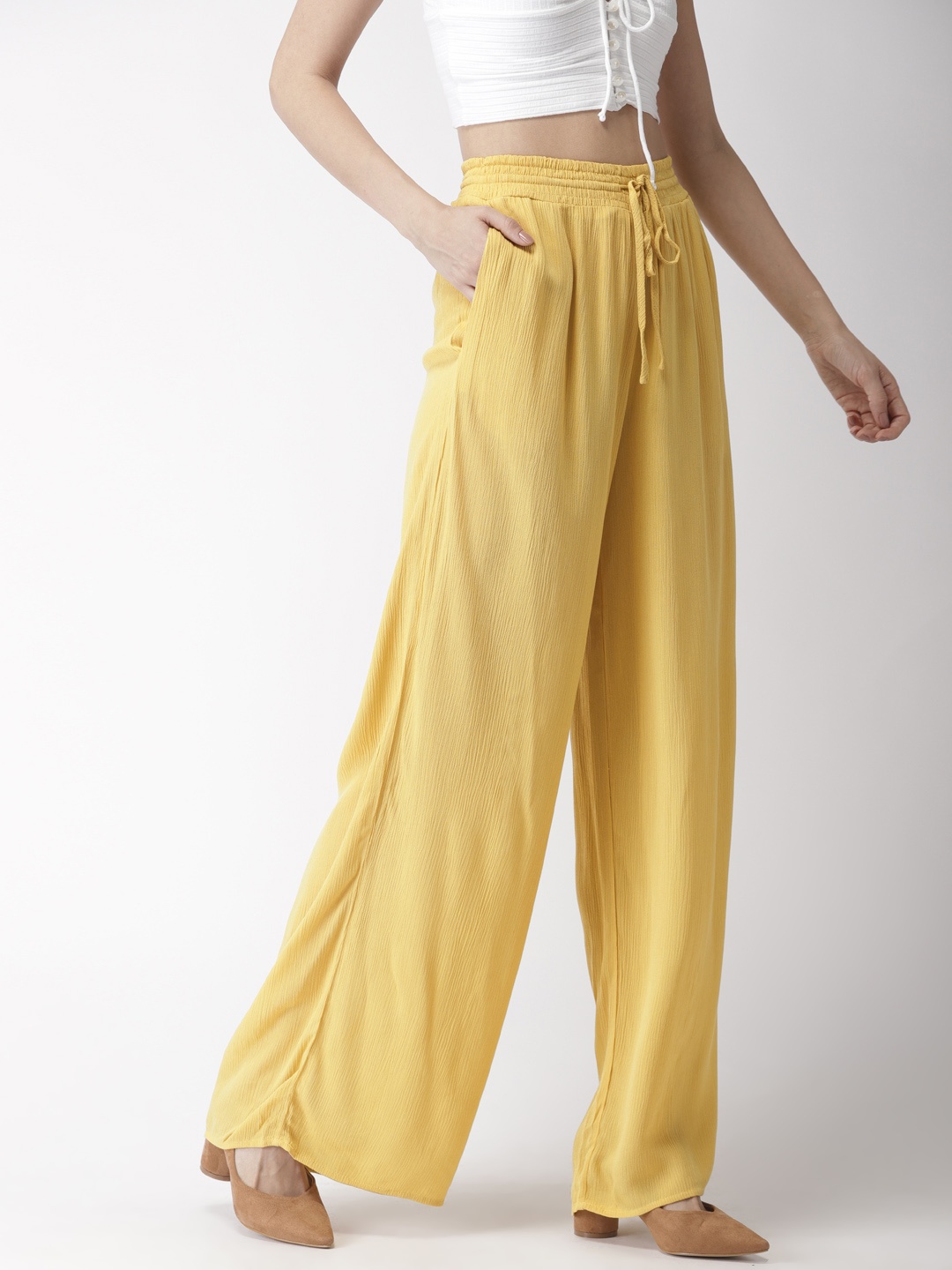 

FOREVER 21 Women Yellow Regular Fit Solid Parallel Trousers