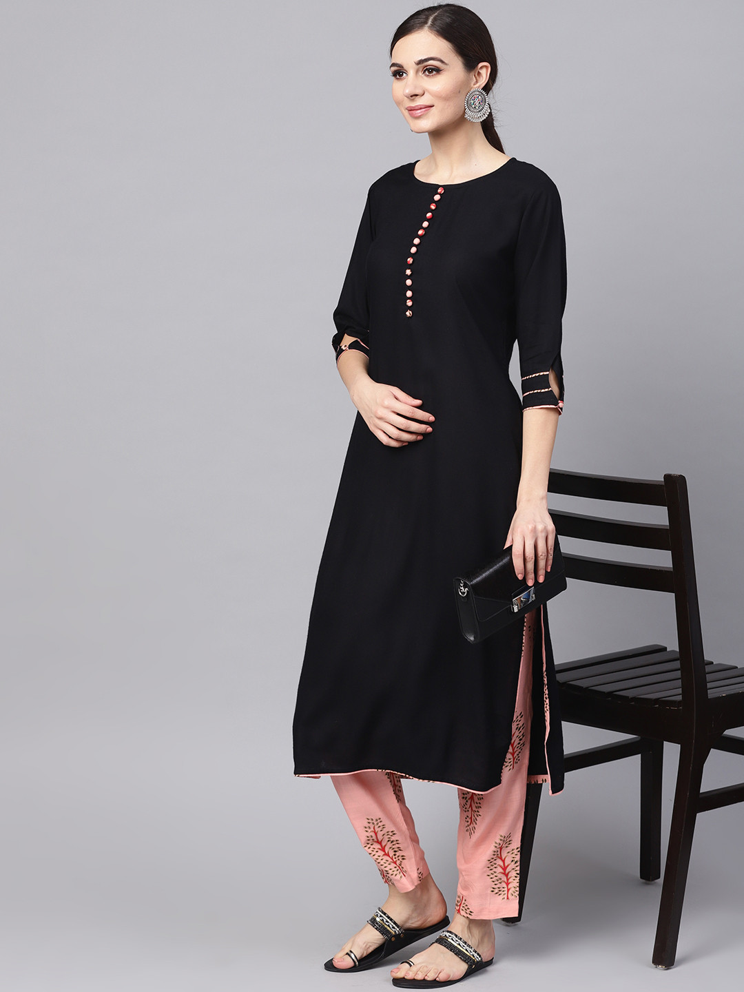 

Idalia Women Black & Peach-Coloured Solid Kurta with Palazzos