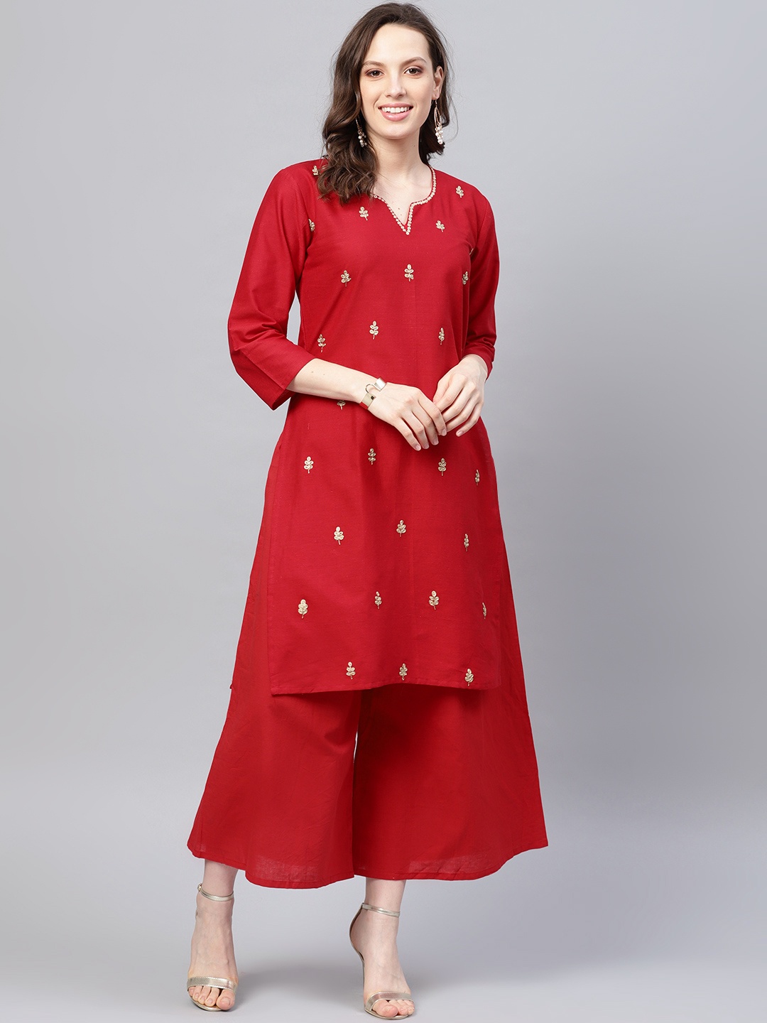 

Bhama Couture Women Red Embroidered Kurta with Palazzos