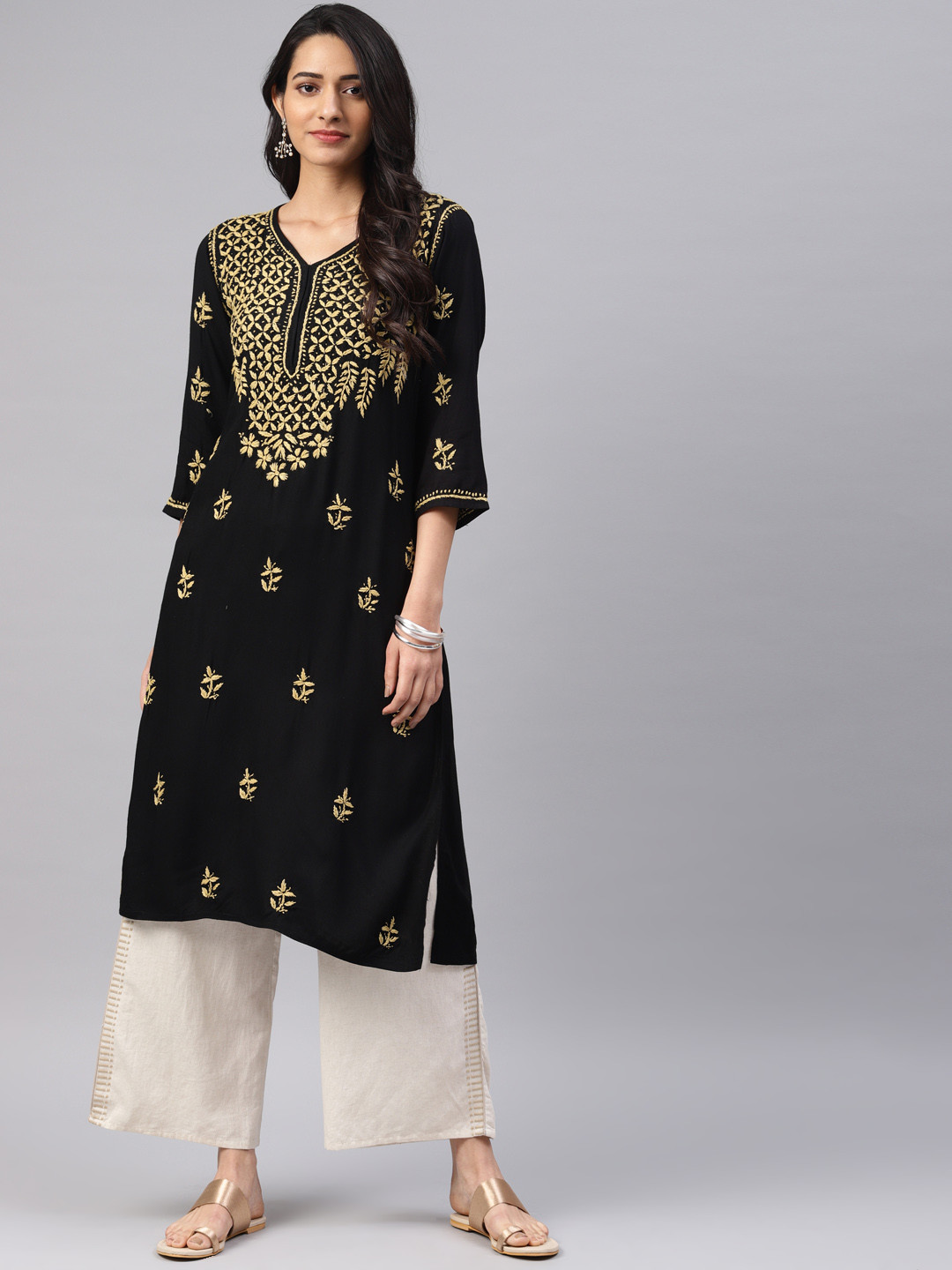 

Saadgi Women Black & Yellow Embroidered Straight Kurta