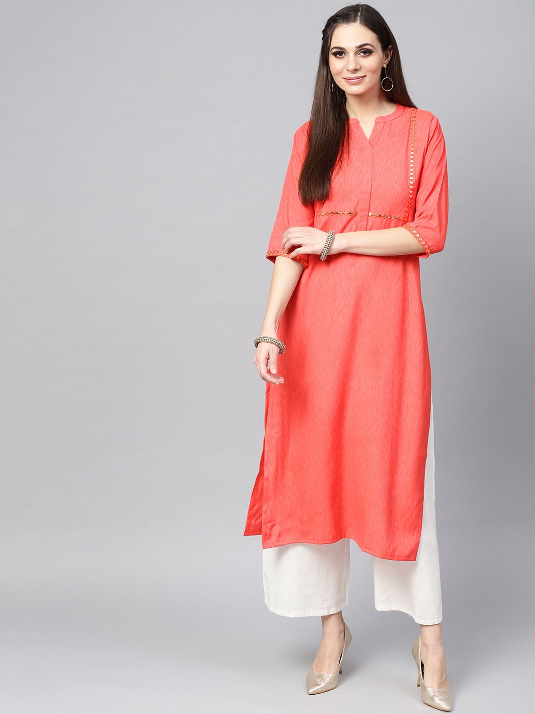 

Libas Women Orange Solid Straight Kurta