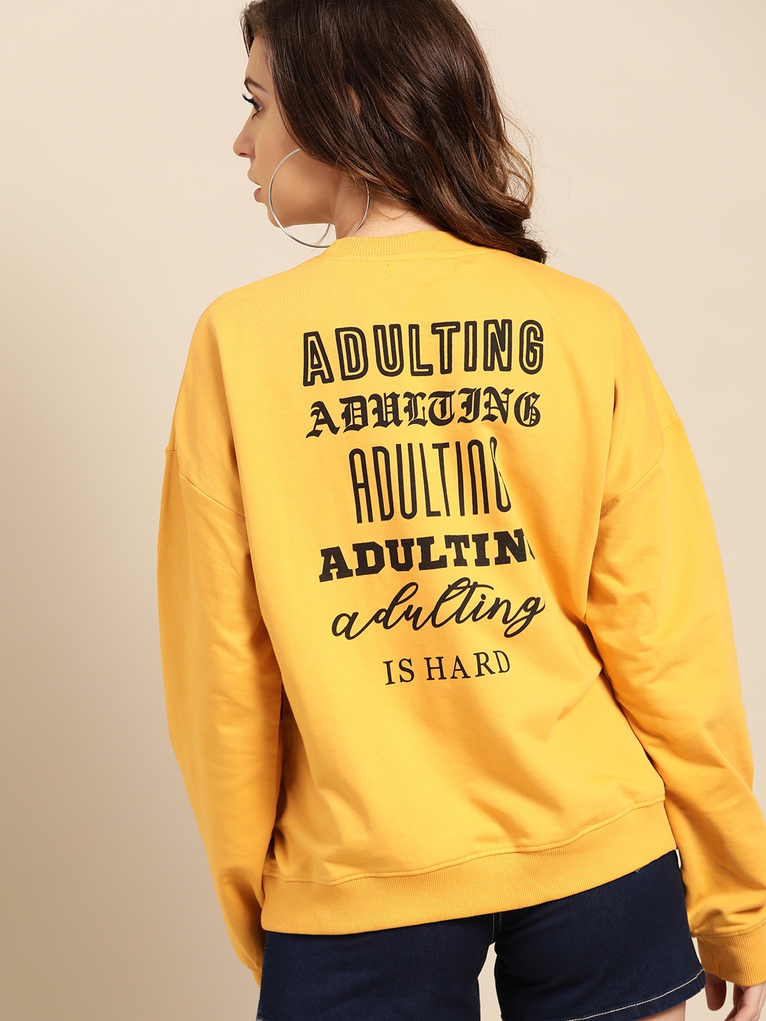 

DressBerry Women Mustard Yellow & Black Printed Back Sweatshirt