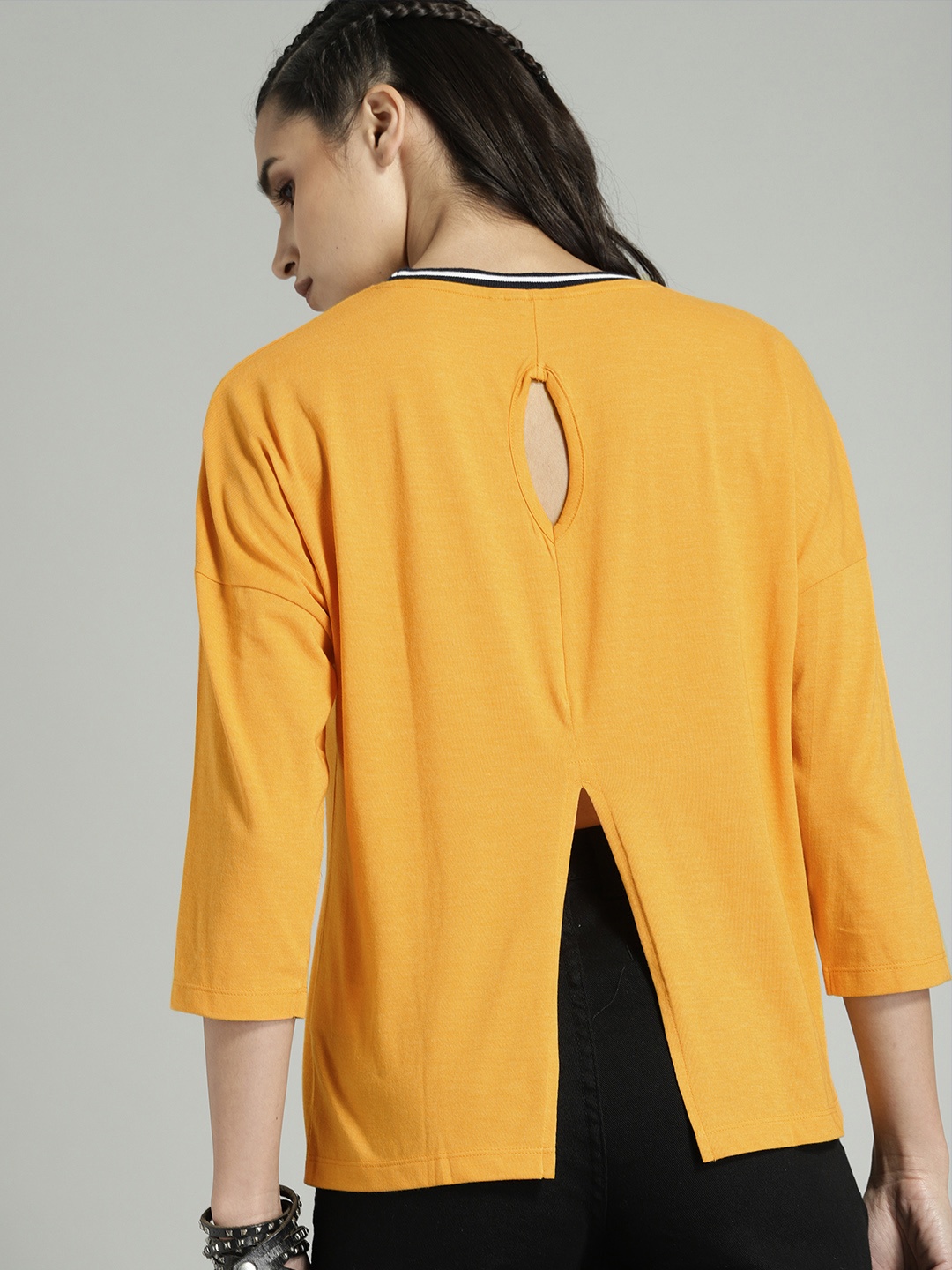 

The Roadster Lifestyle Co Women Yellow Solid Styled Back Top
