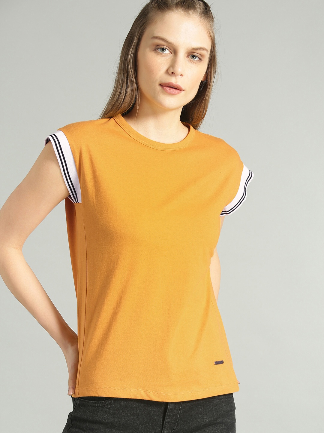 

The Roadster Lifestyle Co Women Mustard Solid Round Neck Pure Cotton T-shirt