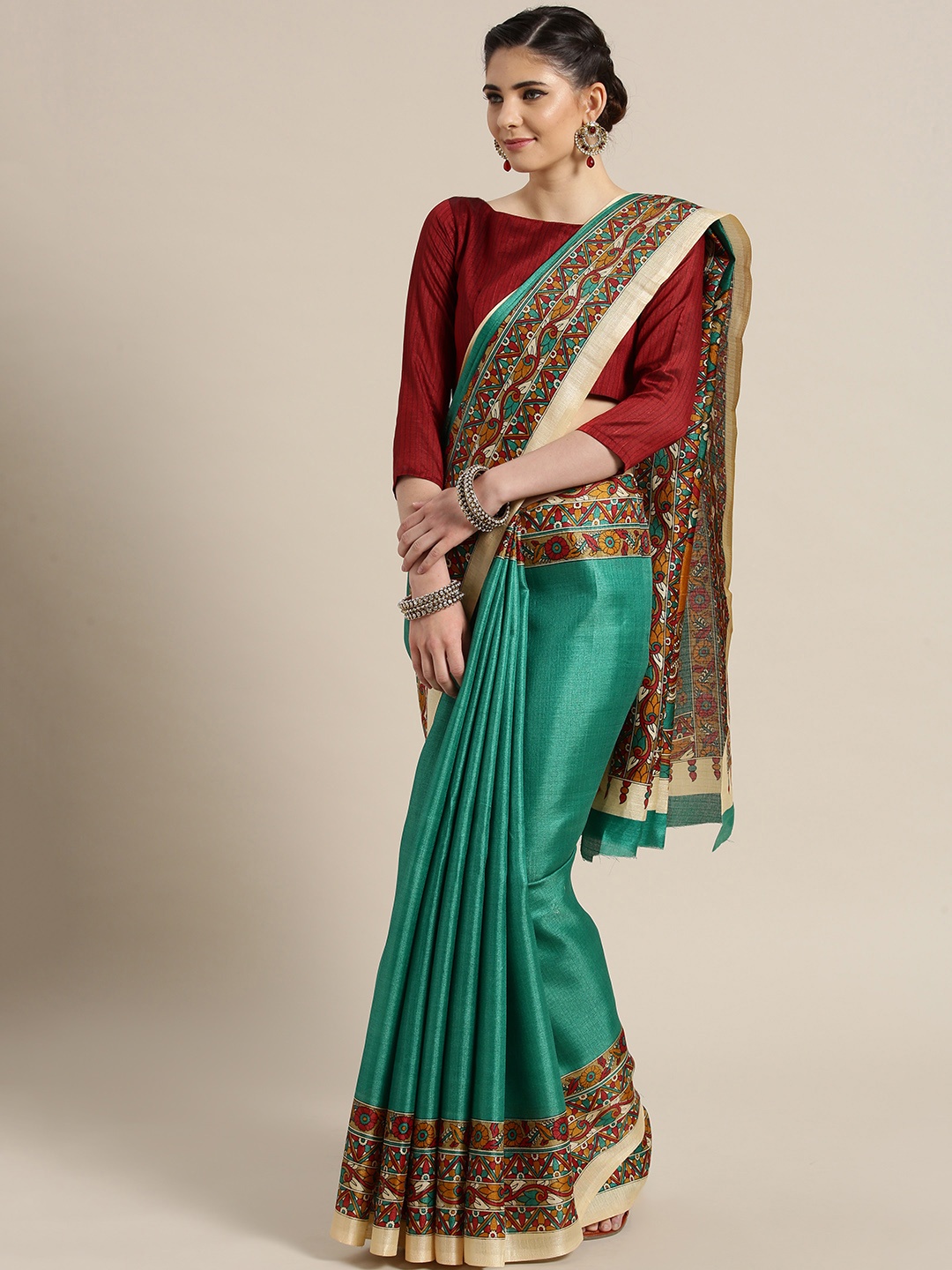 

Saree mall Green & Red Solid Saree