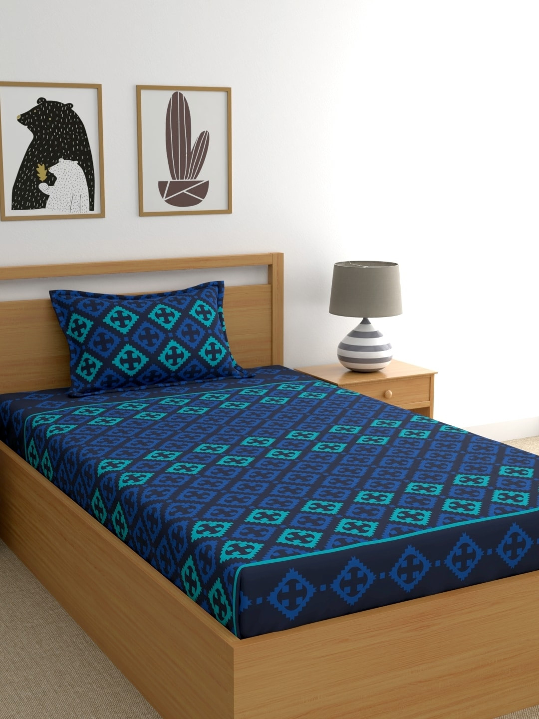 

Home Ecstasy Blue Geometric 140 TC Cotton 1 Single Bedsheet with 1 Pillow Cover