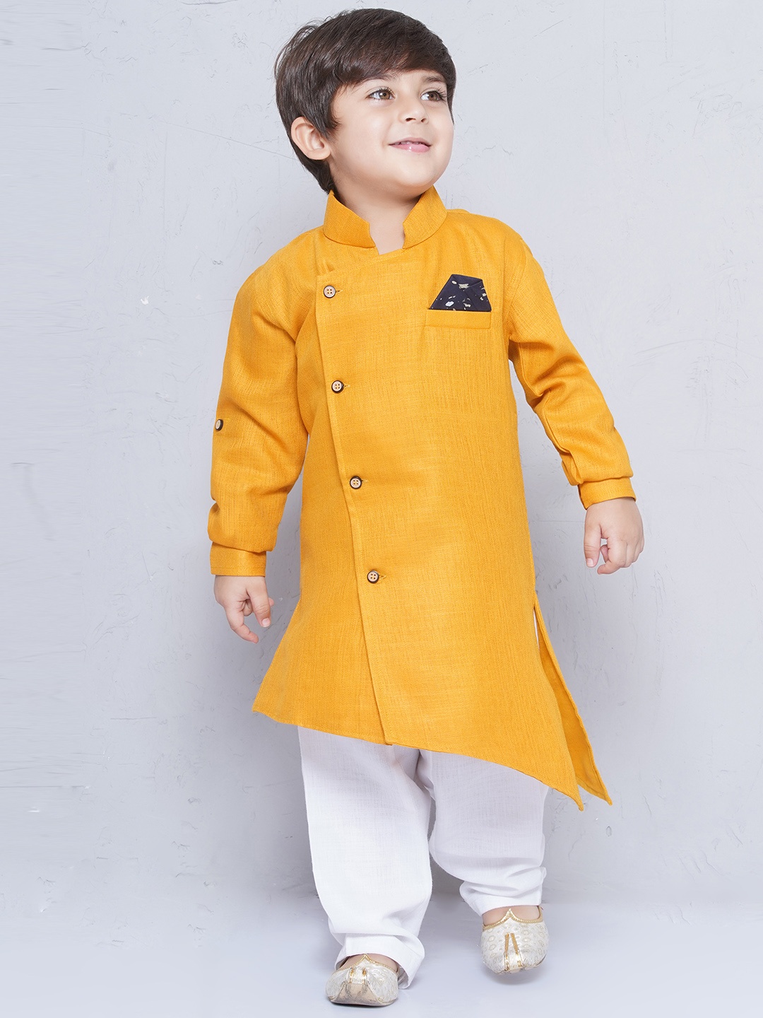 

Aj DEZInES Boys Orange & White Solid Kurta with Pyjamas
