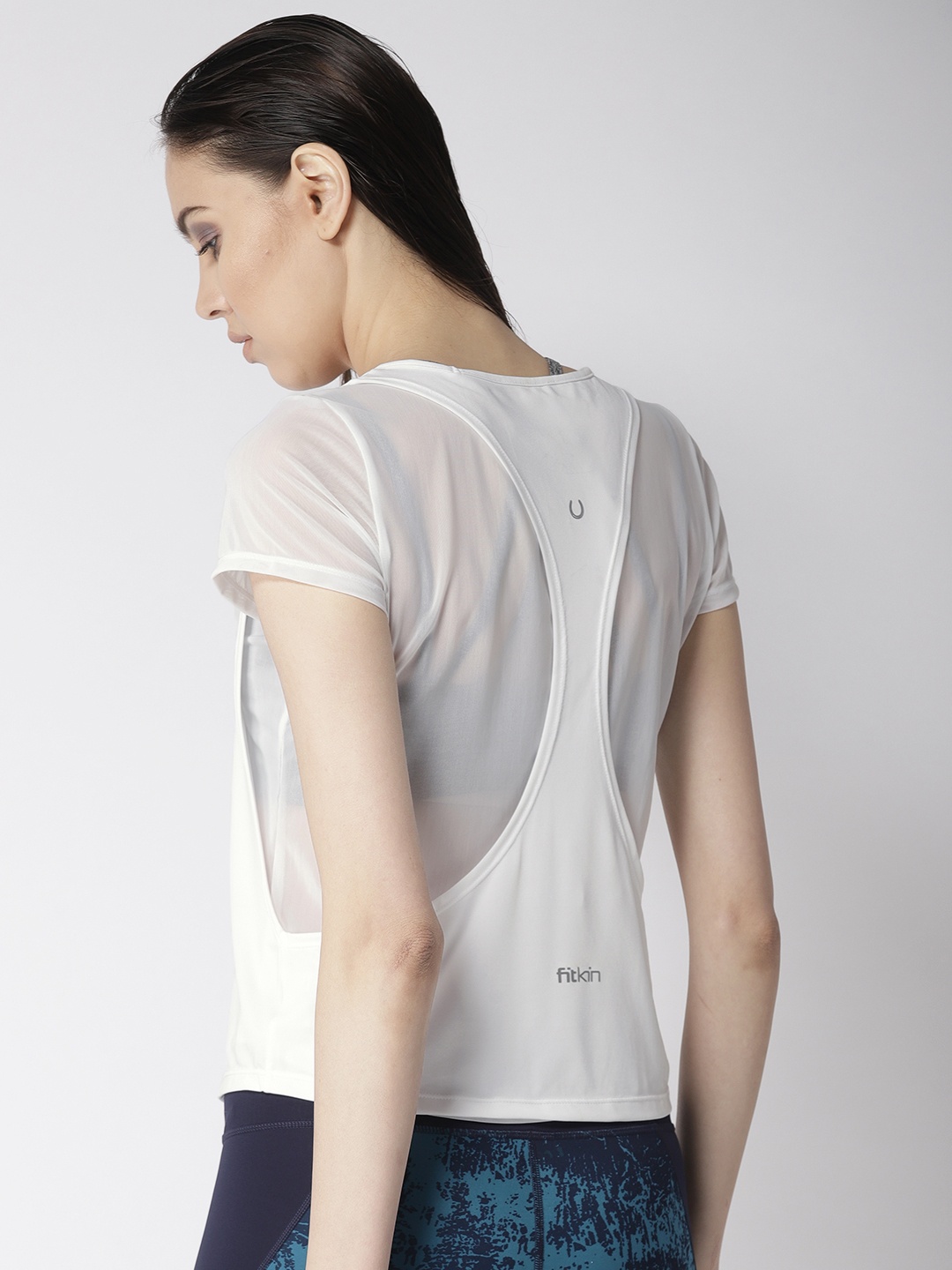 

Fitkin Women White Solid Quick Dry Styled Back Top