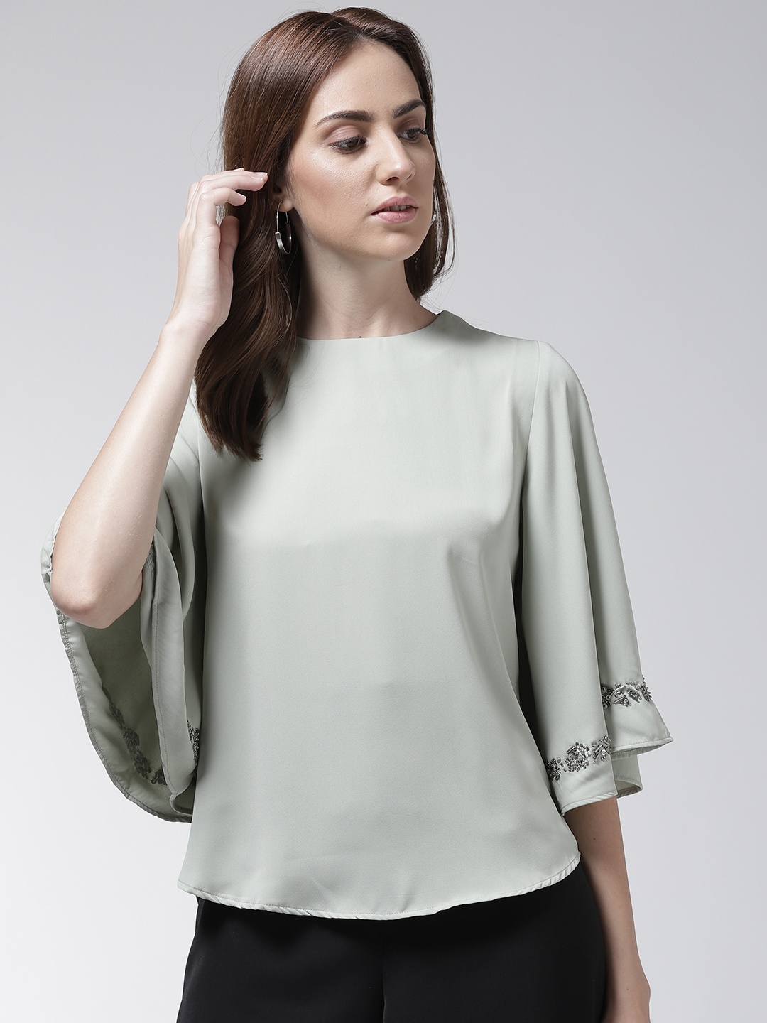 

Madame Women Green Solid Styled Back Top