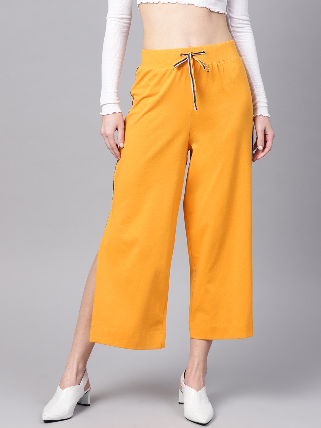 

SASSAFRAS Women Mustard Yellow Regular Fit Solid Cropped Parallel Trousers