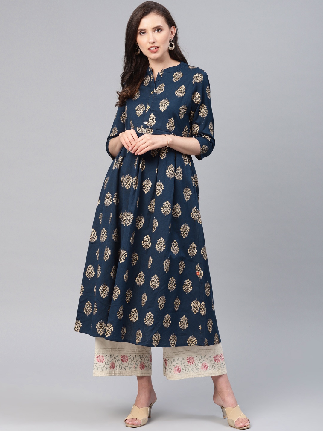 

Alena Women Navy Blue & Gold-Toned Floral Printed Pleated A-Line Kurta