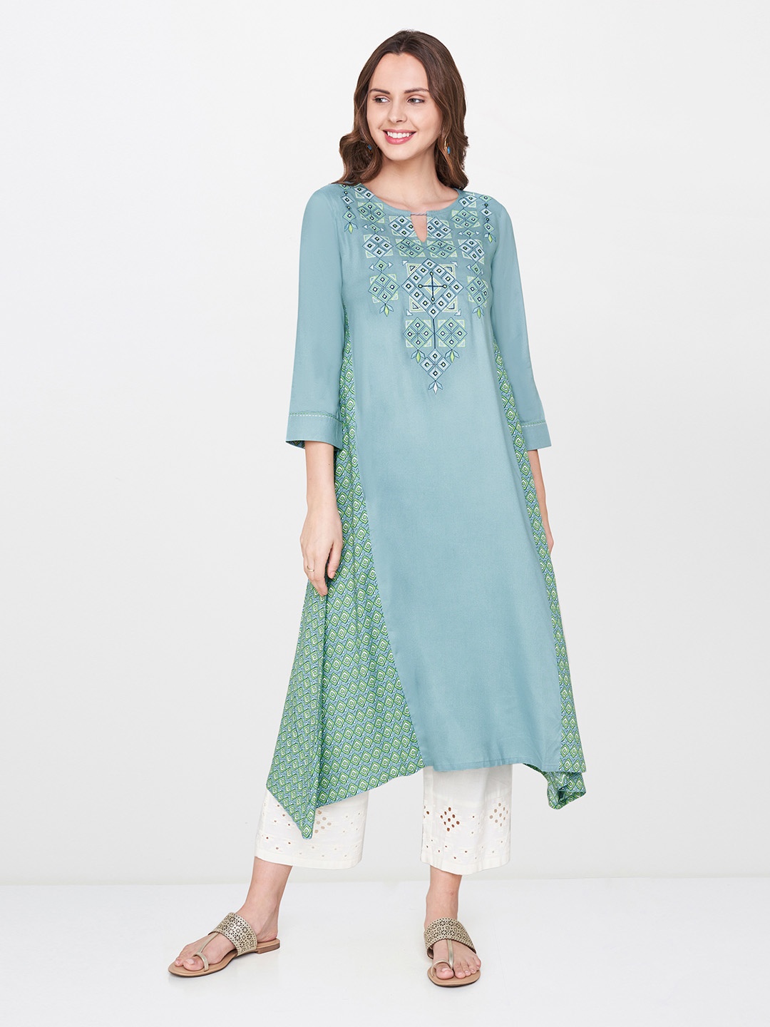 

Global Desi Women Blue Printed Asymmetric A-Line Kurta