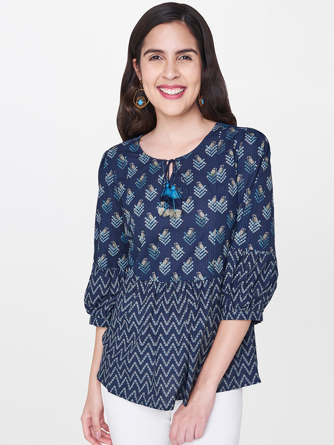 

Global Desi Women Navy Blue Printed Peplum Pure Cotton Top