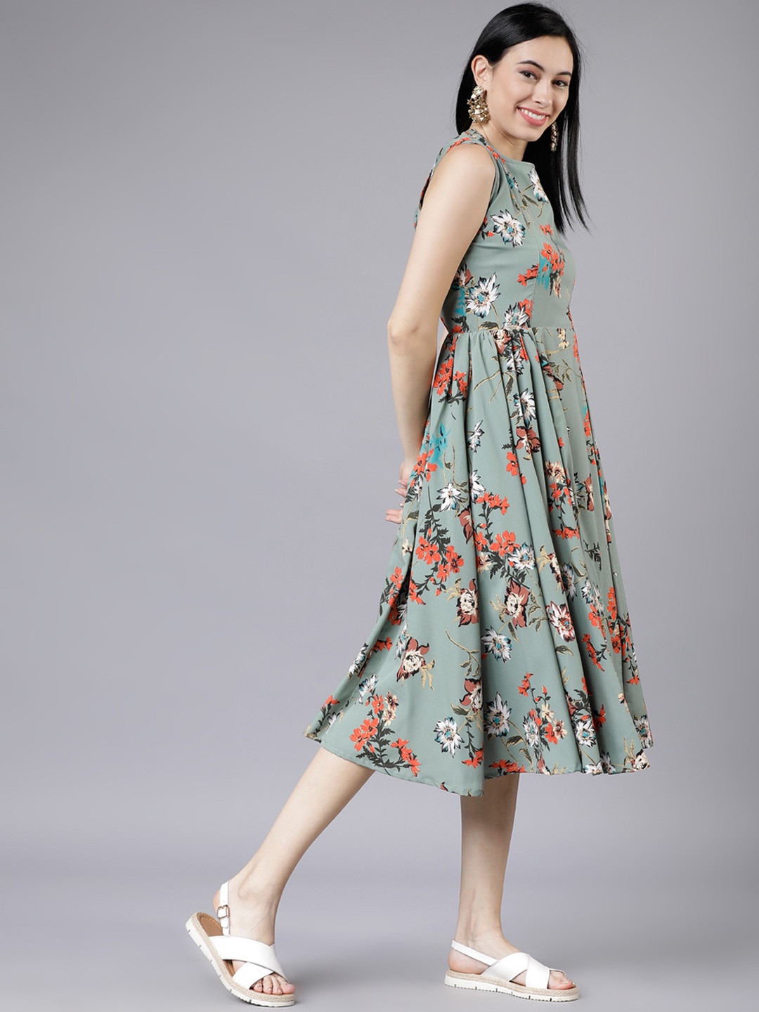 

Tokyo Talkies Women Green Floral Printed Fit and Flare Dress