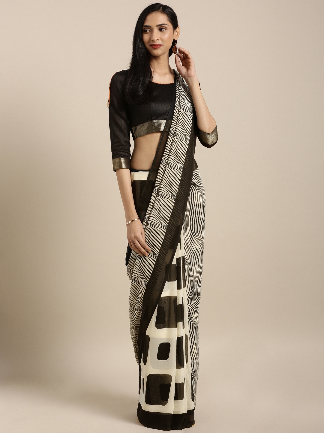 

Satrani Off-White & Black Poly Georgette Printed Saree