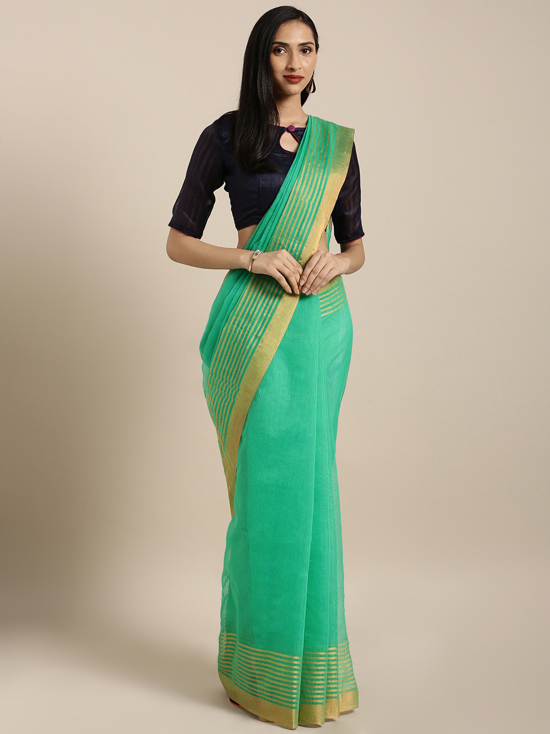 

Satrani Green Woven Design Cotton Blend Saree