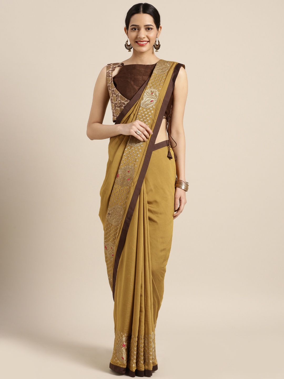 

Aarrah Mustard Solid Cotton Blend Saree