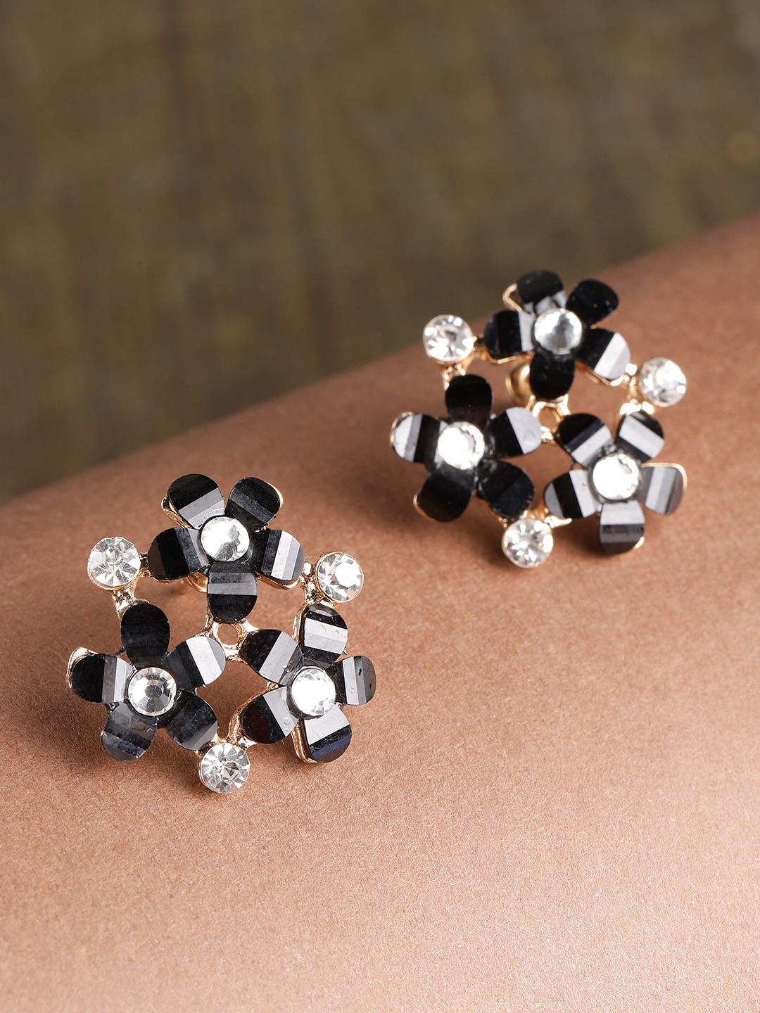 

PRITA BY PRIYAASI Black Gold Plated Stone Studded Handcrafted Floral Oversized Studs