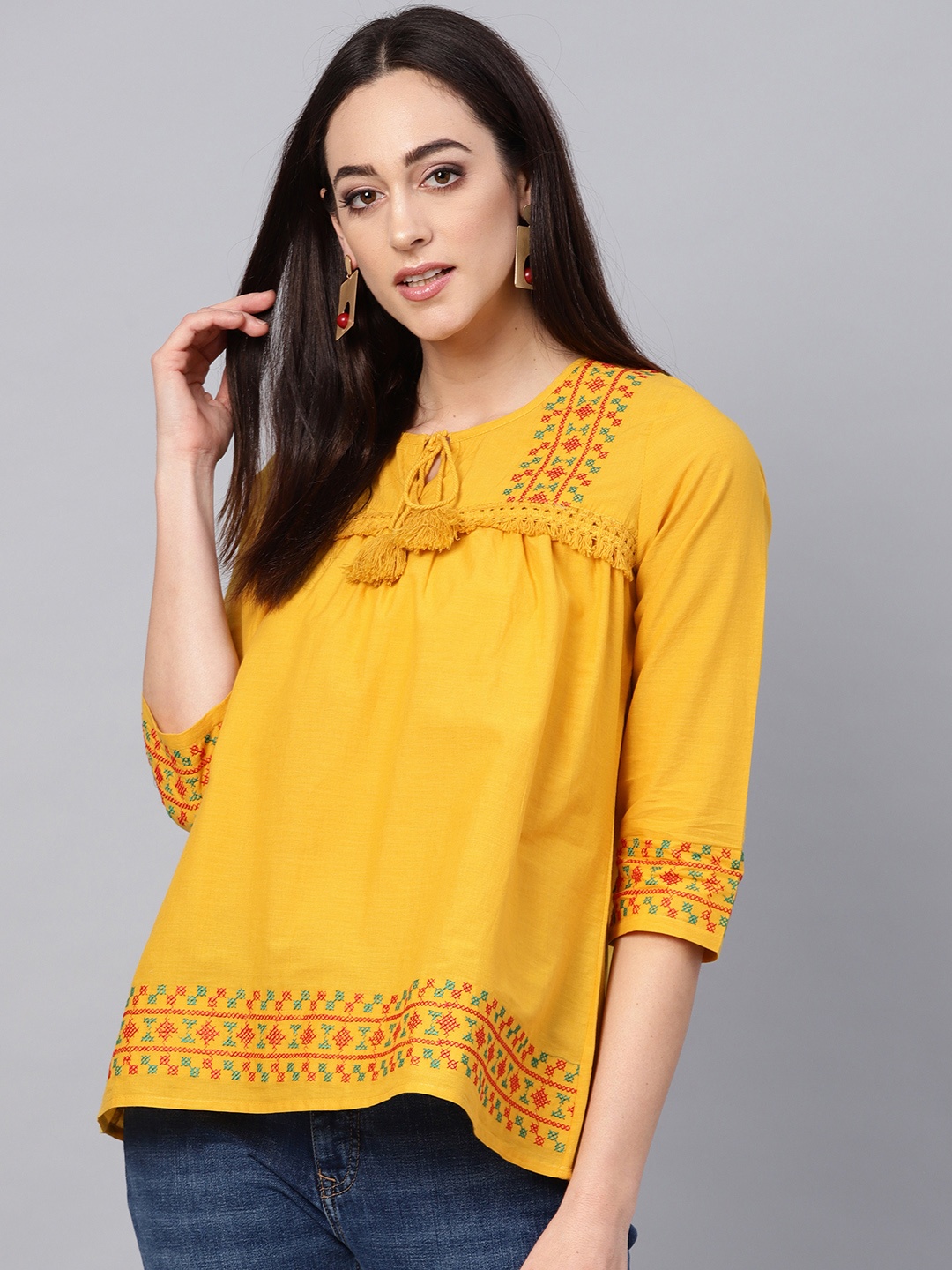 

Bhama Couture Women Mustard Yellow Solid A-line Pure Cotton Top