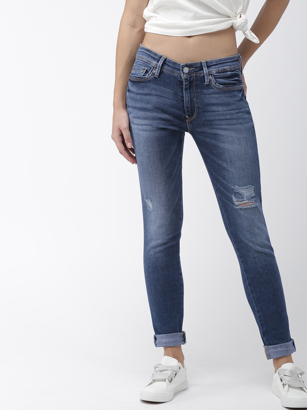 

Levis Women Blue Skinny Fit Mid-Rise Mildly Distressed Stretchable Jeans 711