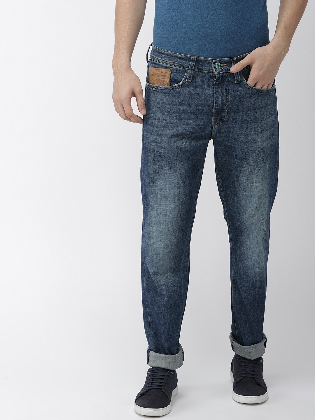 

Levis Men Blue Straight Fit Mid-Rise Low Distressed Stretchable Jeans 513